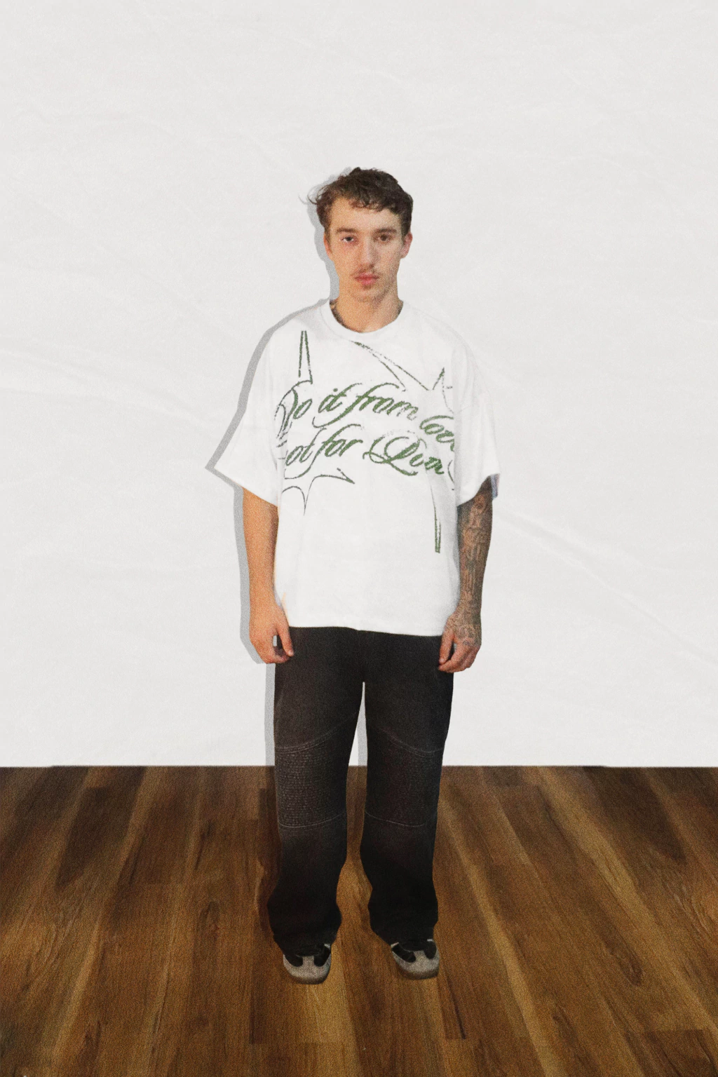 Model wearing green fern t-shirt